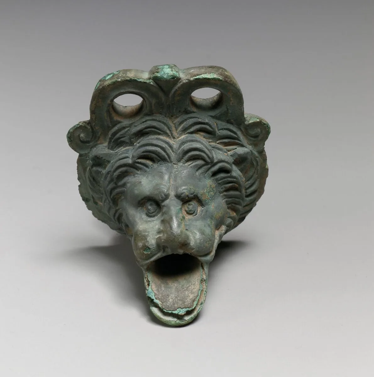 Bronze spout in the form of a lion's head — Unknown