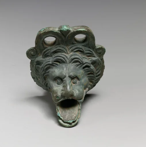 Bronze spout in the form of a lion's head