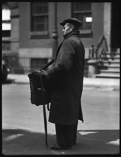 [Organ Grinder Street Musician, Possibly Bethune Street, New York City]