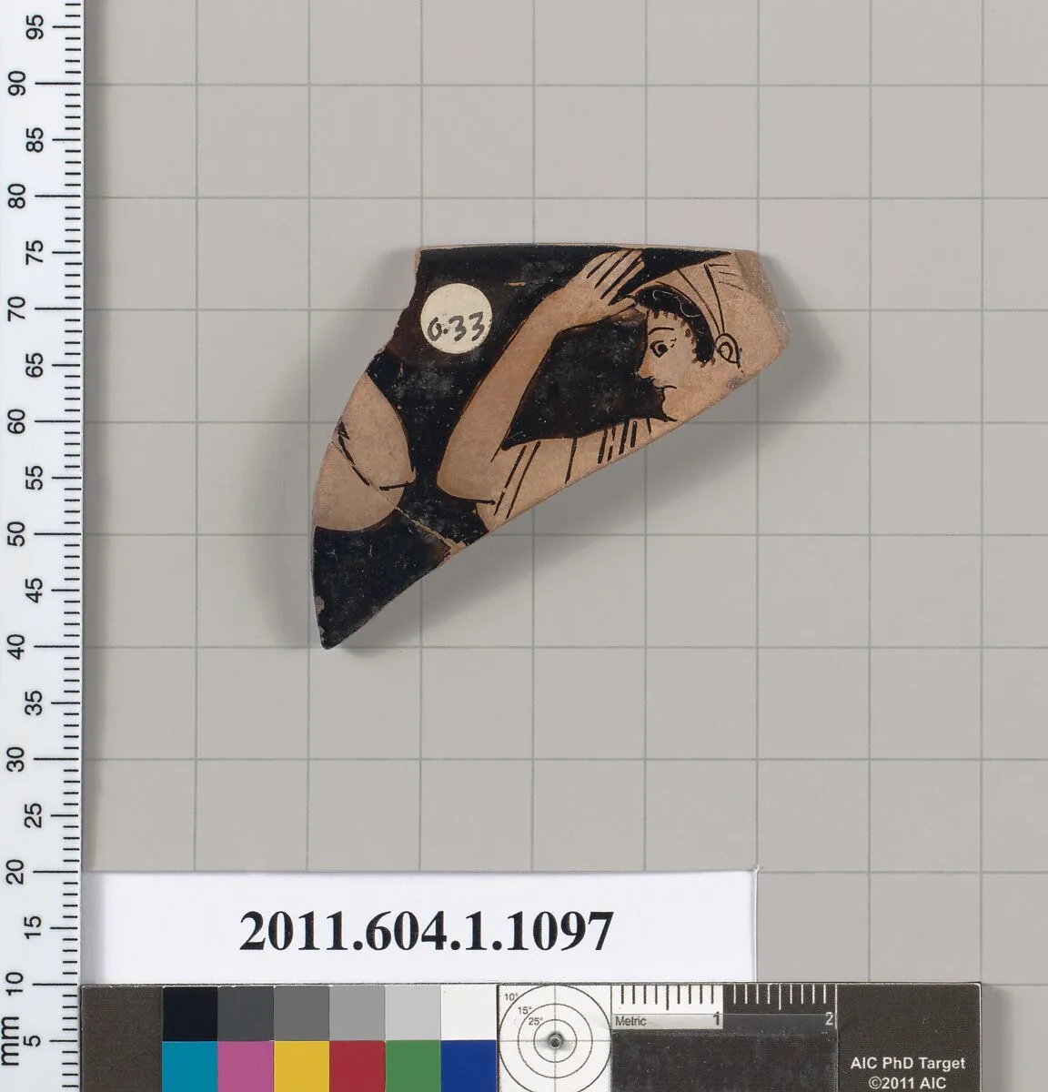Terracotta rim fragment of a kylix (drinking cup) — Nikosthenes Painter