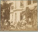 [Group on Lawn and Benches Before House, Possibly Sanatorium]