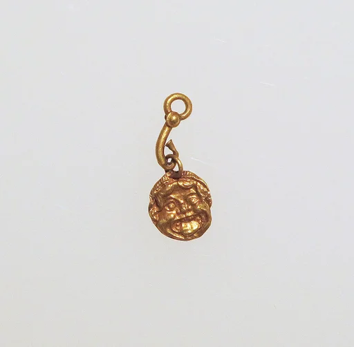 Pendant in the form of a Gorgoneion eye charm