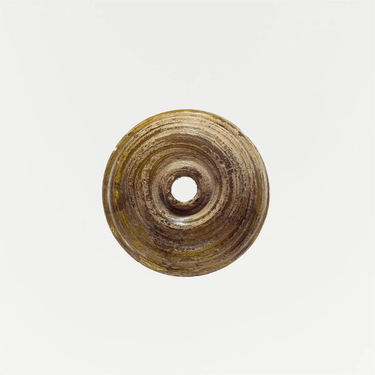 Glass spindle whorl — Unknown