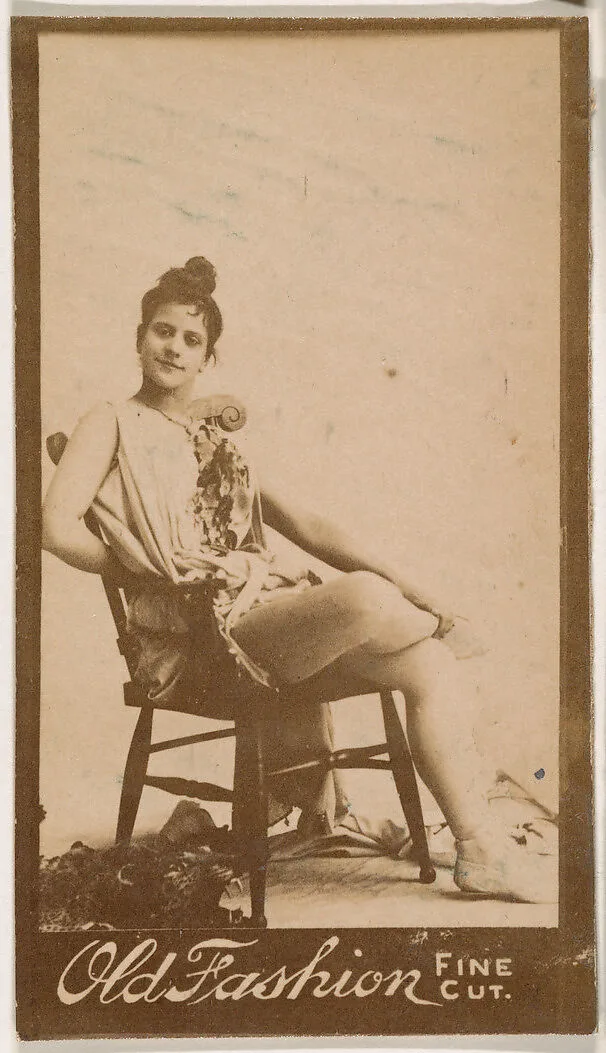 Actress seated in chair, from the Actresses series (N664) promoting Old Fashion Fine Cut Tobacco — Unknown