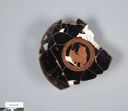 Terracotta fragment of a kylix (drinking cup)