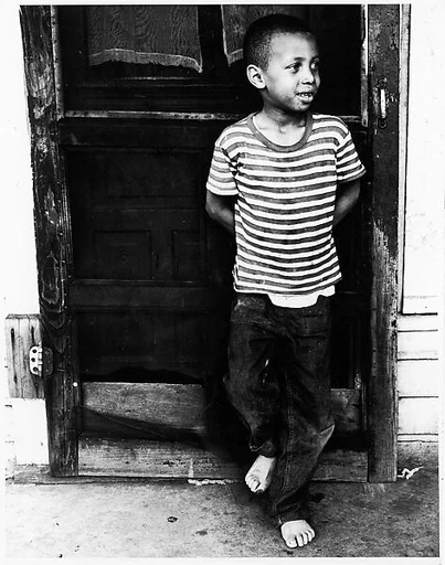 [Boy in Striped Shirt]