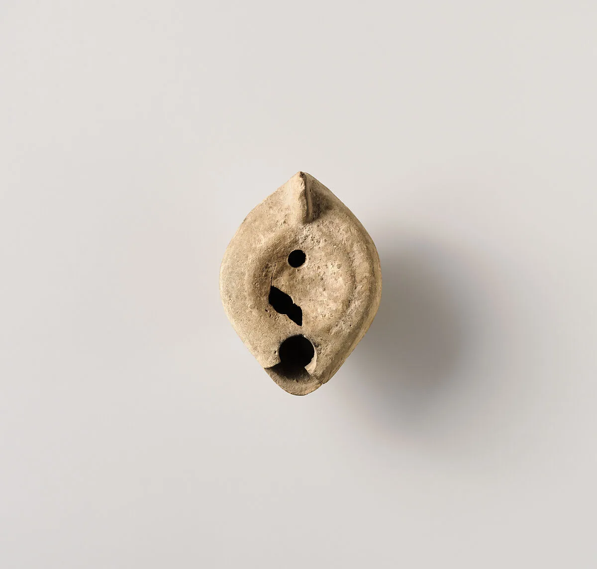 Terracotta oil lamp — Unknown
