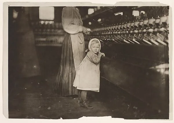 Ivey Mill, Hickory, N.C. Little one, 3 years old, who visits and plays in the mill. Daughter of the overseer. — Lewis Hine