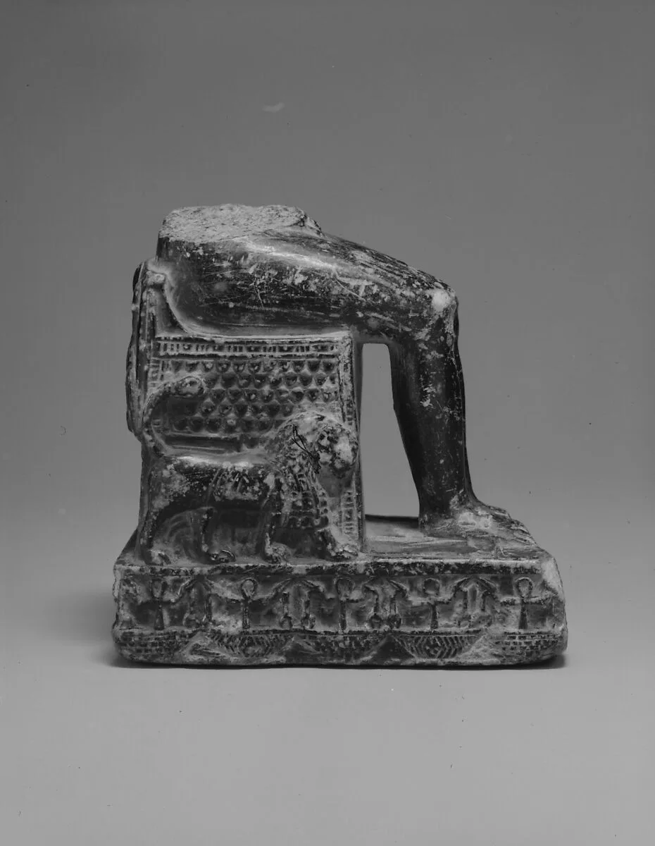 Lower part of enthroned child god, probably Harpokrates — Unknown