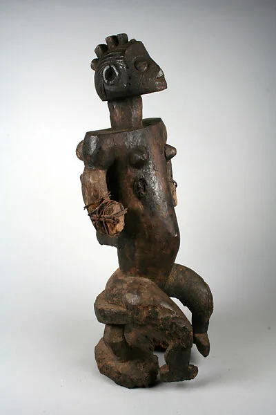 Figure: Seated Mother and Child — Unknown