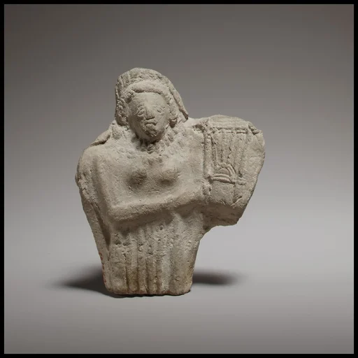 Standing female kithara player