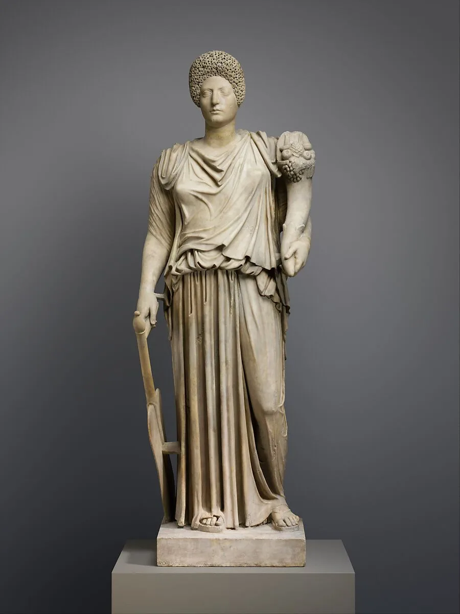 Marble statue of Tyche-Fortuna restored with the portrait head of a woman — Unknown