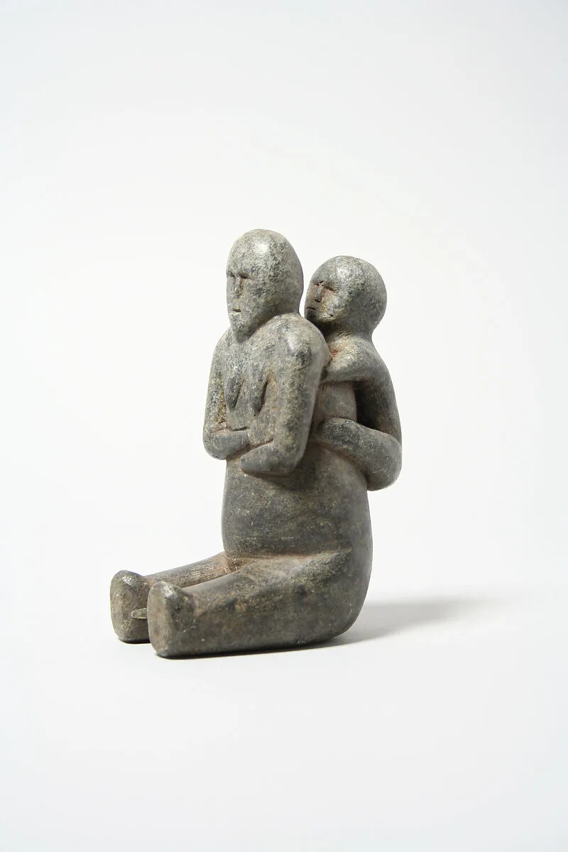 Stone Mother and Child Figure — Unknown