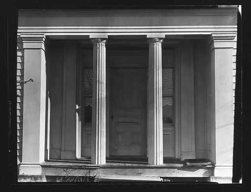 [Recessed Greek Revival Entry Porch with Doric Columns, New York]