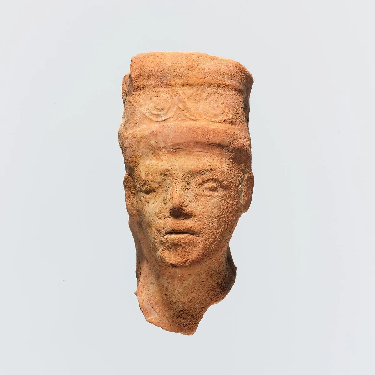 Terracotta head of a woman — Unknown