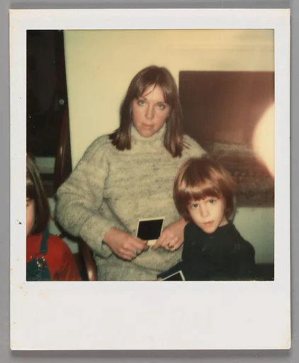 [Unidentified Family: Mother and Child with Polaroid]