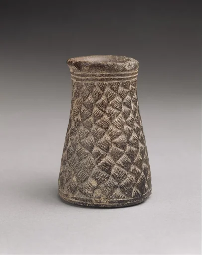Vase with basket-weave pattern