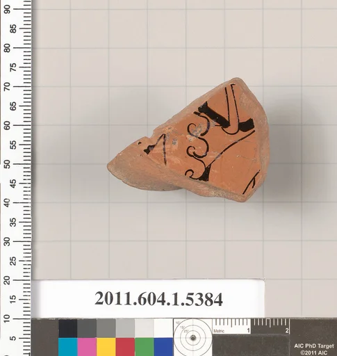 Terracotta fragment of a kylix (drinking cup)