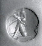 Stamp seal (oval conoid) with deity (?)