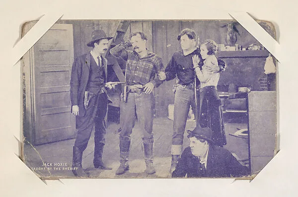 Jack Hoxie caught by the sheriff from Western Stars or Scenes Exhibit Cards series (W412) — Unknown