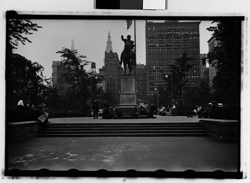 [Two 35mm Film Frames: George Washington Statue with Men Around Base, Union Square Park, New York City]