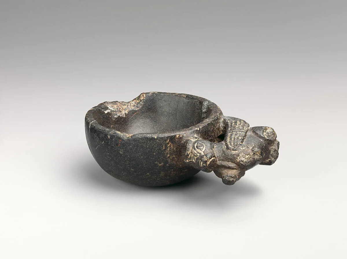 Bowl with a handle in the form of a winged bull — Unknown