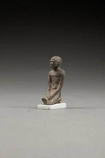Kneeling Priest, Pouring Libation