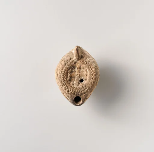 Terracotta oil lamp