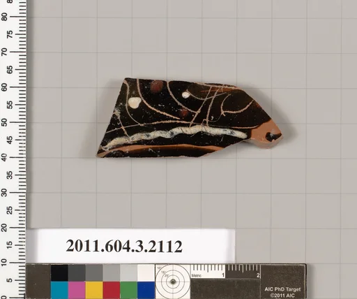 Terracotta fragment of a kylix (drinking cup)