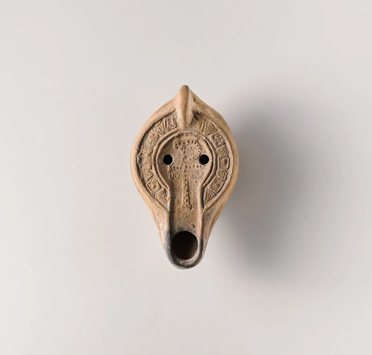 Terracotta oil lamp — Unknown