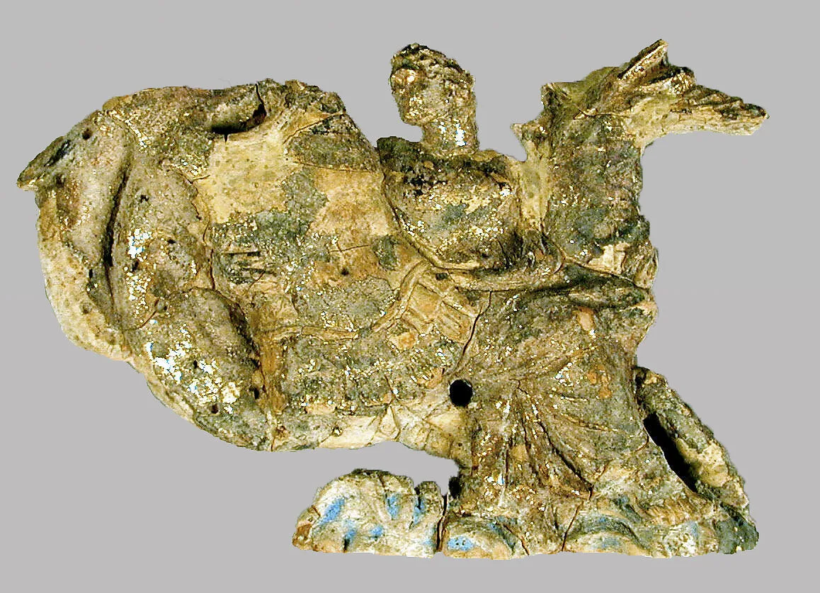 Terracotta relief of a nereid carrying a cuirass — Unknown
