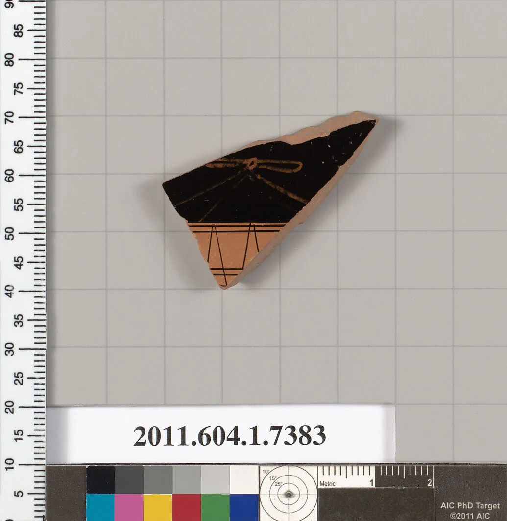 Terracotta fragment of a kylix (drinking cup) — Makron