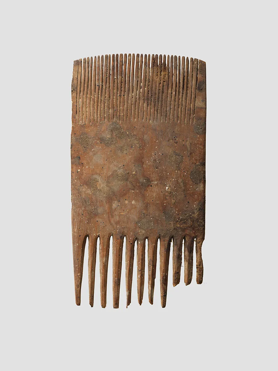 Double-sided wooden comb — Unknown
