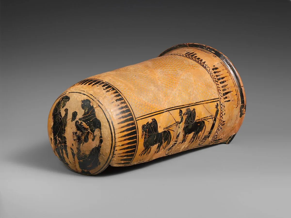 Terracotta onos (leg guard used in carding wool) — Unknown