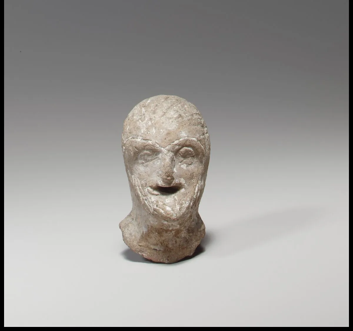 Head of a comic figurine — Unknown