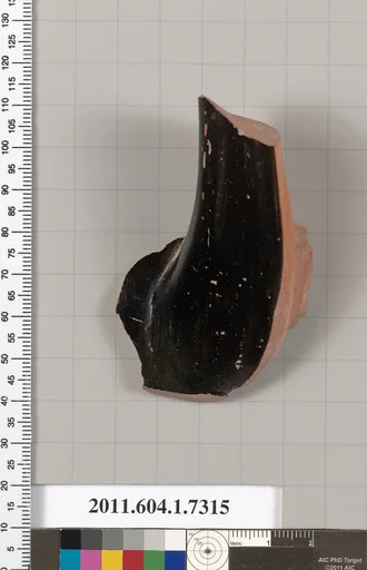 Terracotta fragment of a kylix (drinking cup)