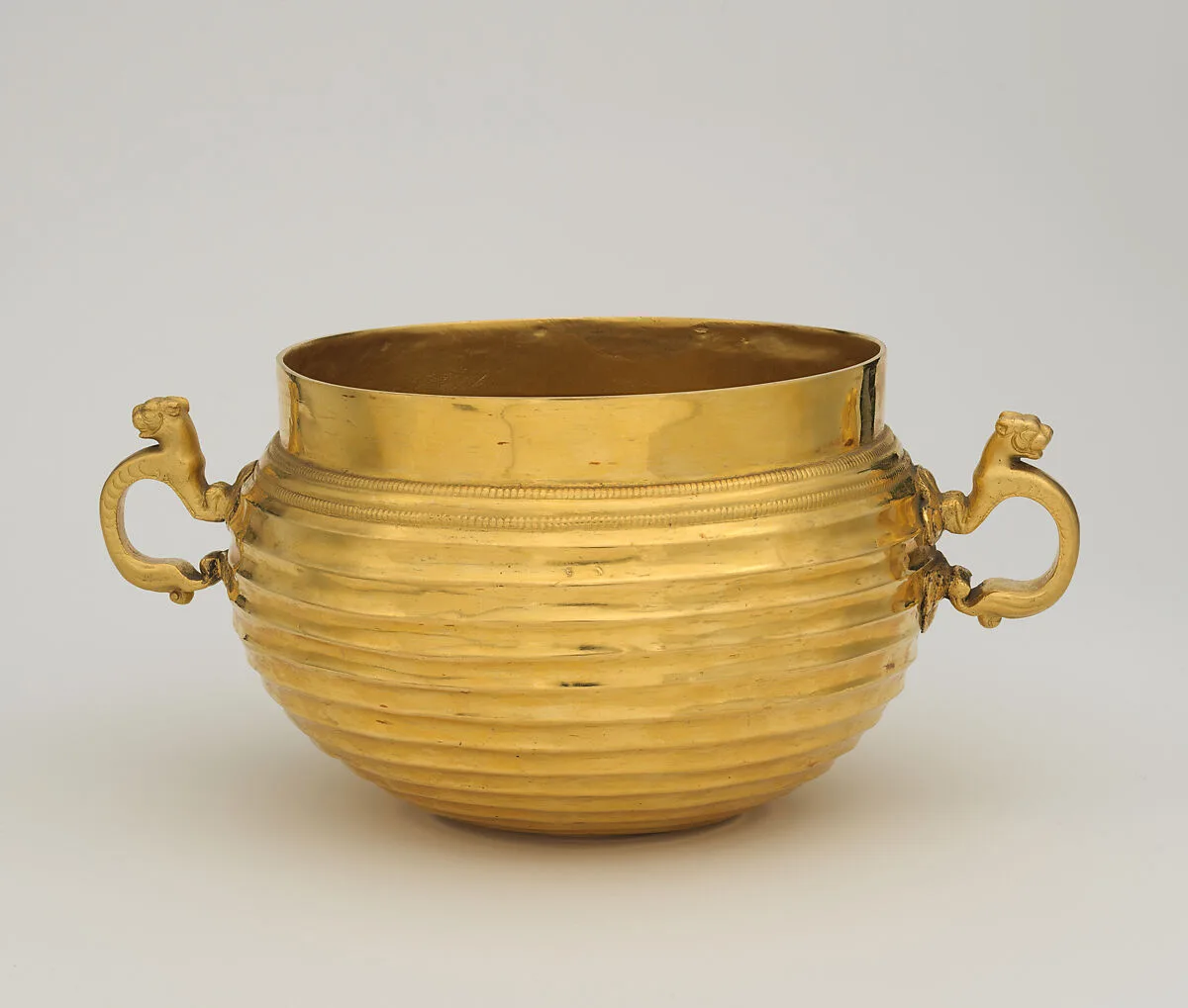 Reproduction of a Scythian bowl with animal handles — Unknown
