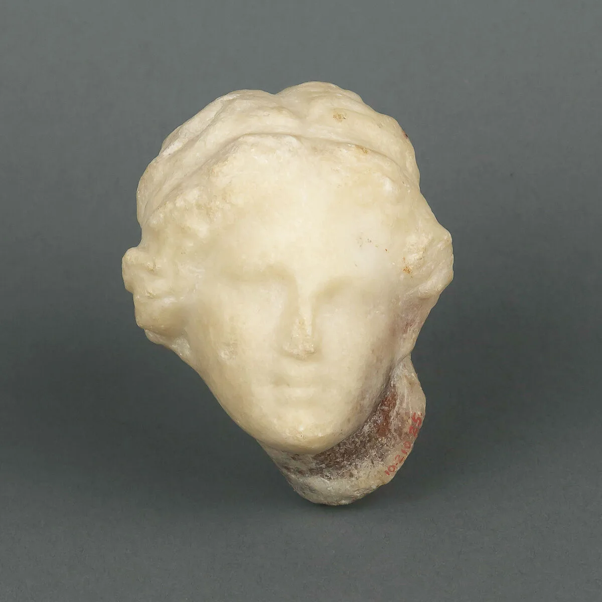 Head of a marble Aphrodite statuette — Unknown
