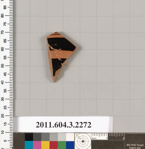 Terracotta fragment of a kylix (drinking cup)