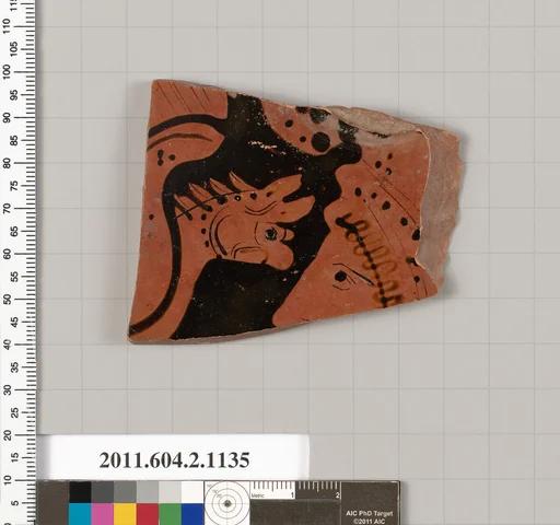 Terracotta fragment of a lekanis lid (covered dish)