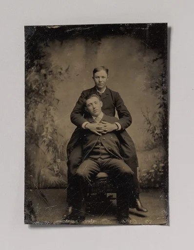 [Two Young Men, One Embracing the Other]