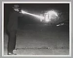 OAKLAND, CALIF. Charles B. Campbell, Washington, D.C., G-Man, is shown demonstrating the use of sub-machine guns to local police at the target range here. This picture, showing Campbell’s accuracy on the target body, was taken with flash bulb lighting in a fraction of a second, yet eight bullet traces are visible, all striking the figure in the chest and stomach — ACME Newspictures Inc.