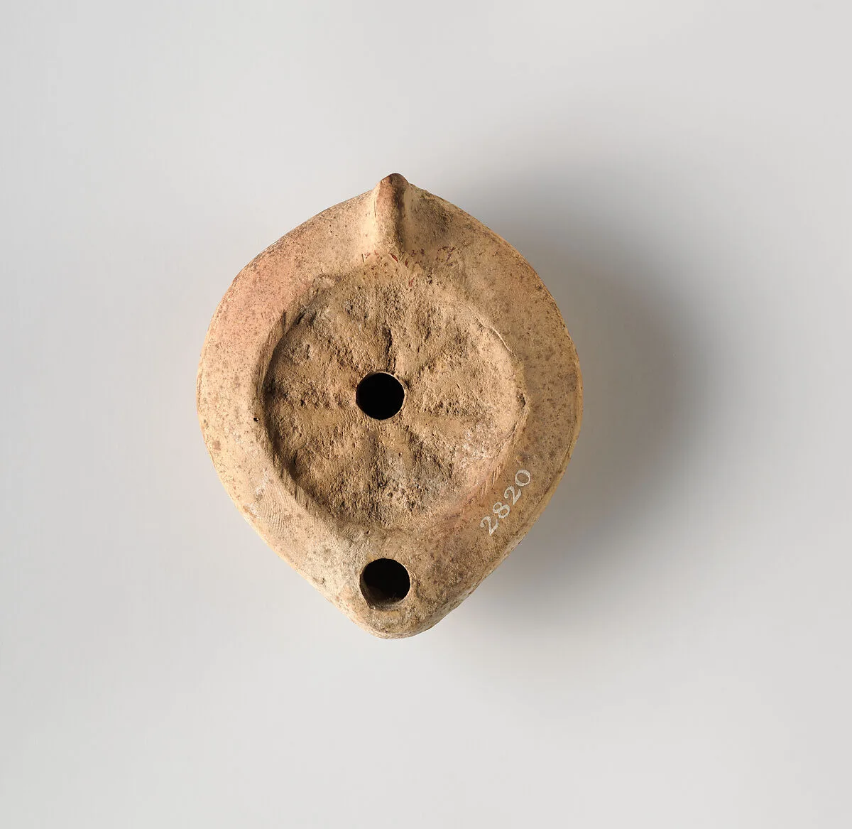 Terracotta oil lamp — Unknown
