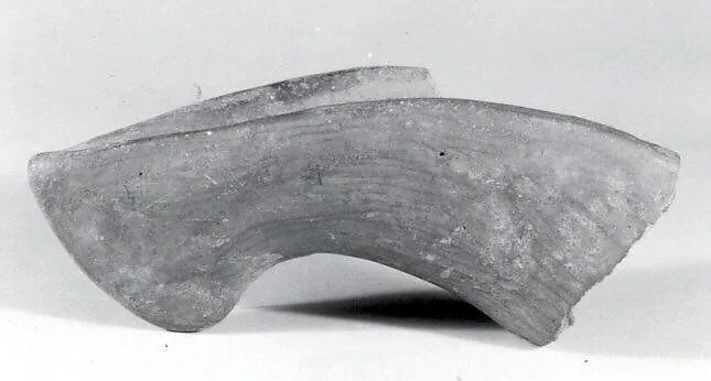 Curved spout — Unknown