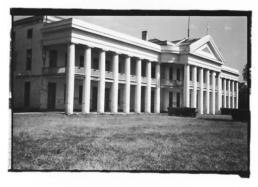 [Large Greek Revival Building with Cross Over Centered Gable, Convent, Louisiana]