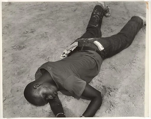 [Man Lying Face-down on Beach, Coney Island, New York City]