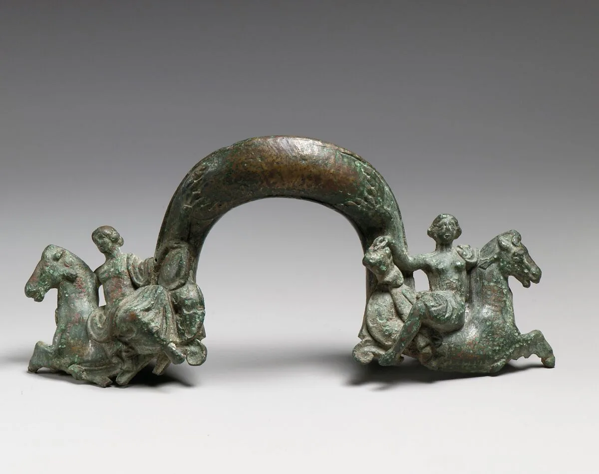 Bronze handle of a shallow basin — Unknown