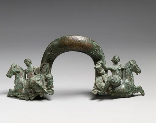 Bronze handle of a shallow basin
