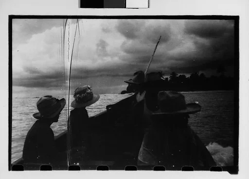 [Three 35mm Film Frames: South Seas: Cressida Passengers in Small Boat]