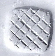 Loop (?) handled rectangular stamping device — Unknown